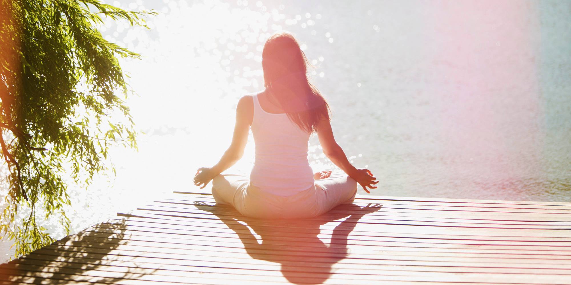 Mindful wellness meditation in natural morning sunlight
